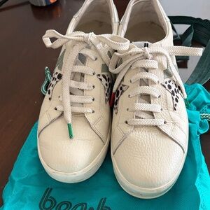 Women's Off-White Leather Low-Top Sneakers with Black and Sage Accents